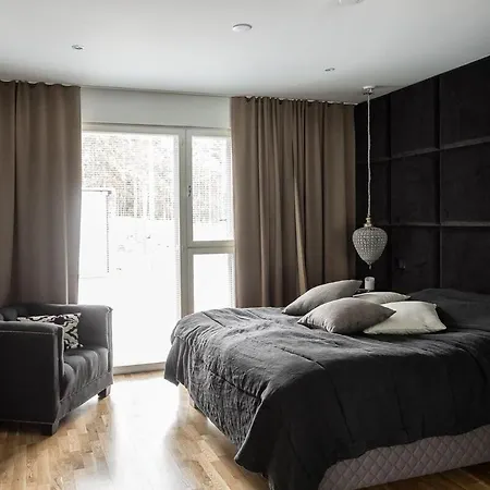 Ferienhaus Tyylikaes Lomahuoneisto Kultarannassa *